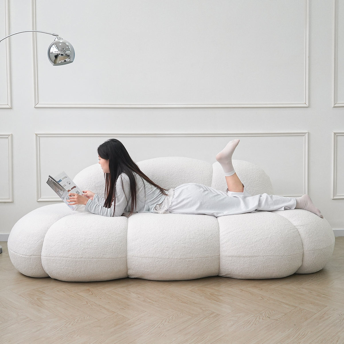 White boucle boneless couch, with a person reading on it — 3-Seat — White