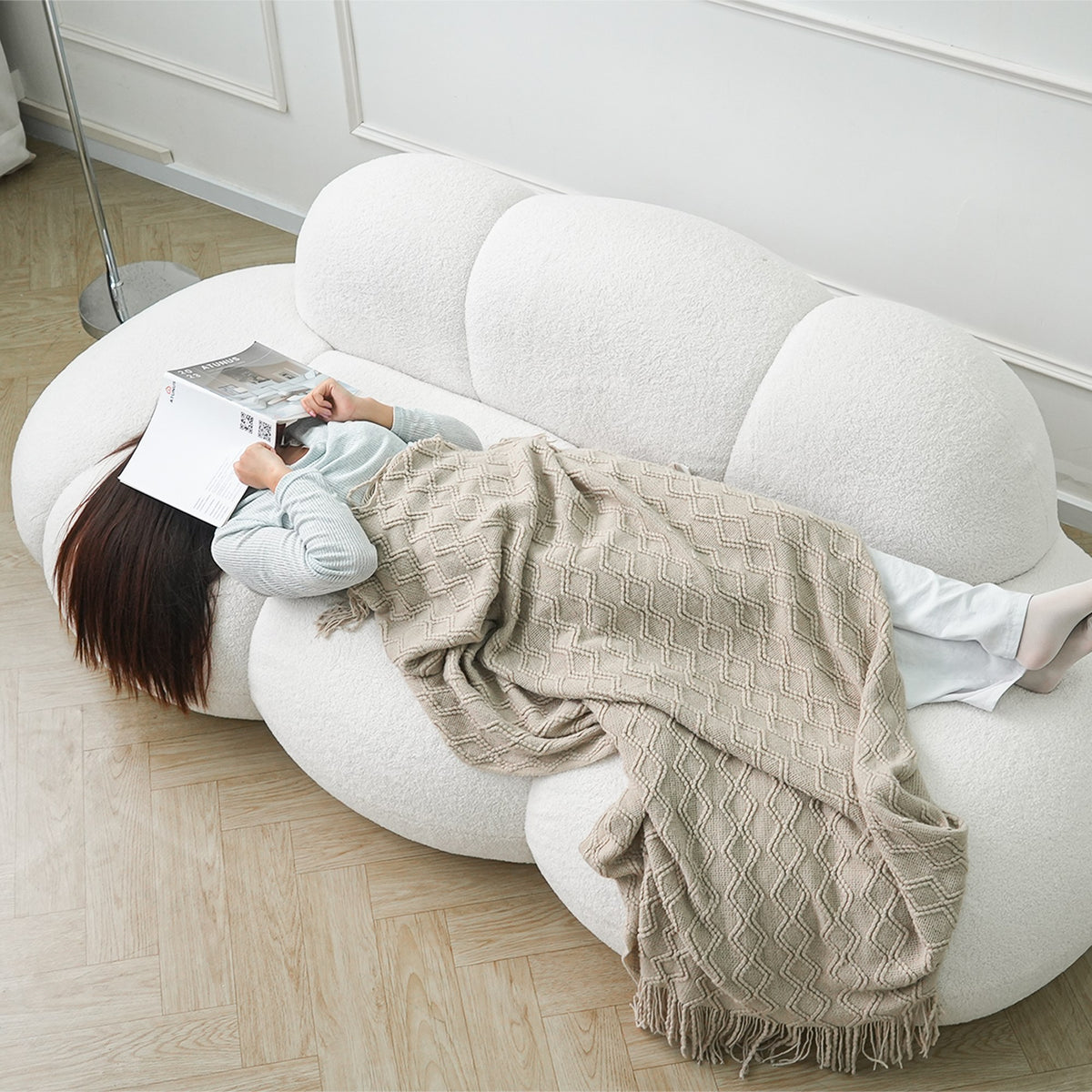 White boucle boneless couch, with a person relaxing under a throw — 3-Seat — White