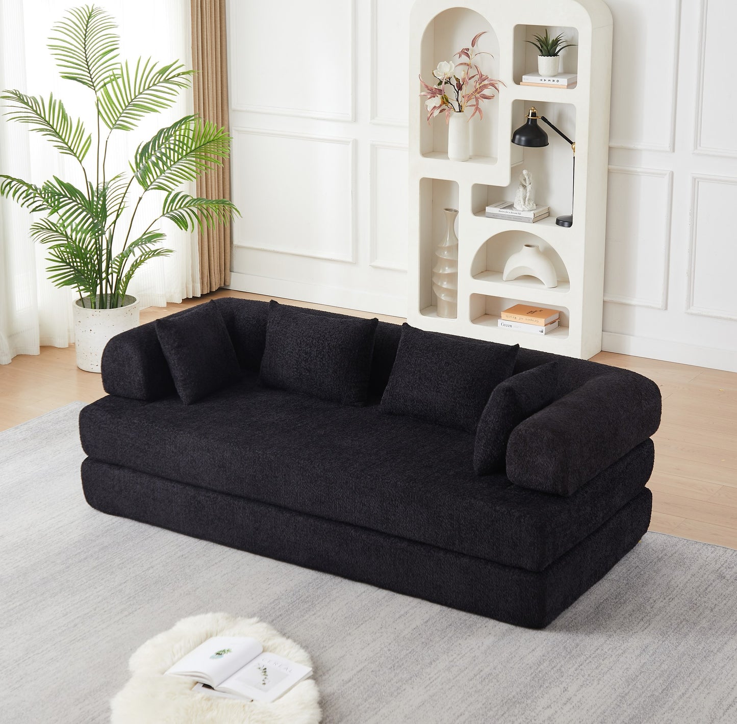 Black chenille compression sofa bed, 79-inch 2-seat, in a living room — Black