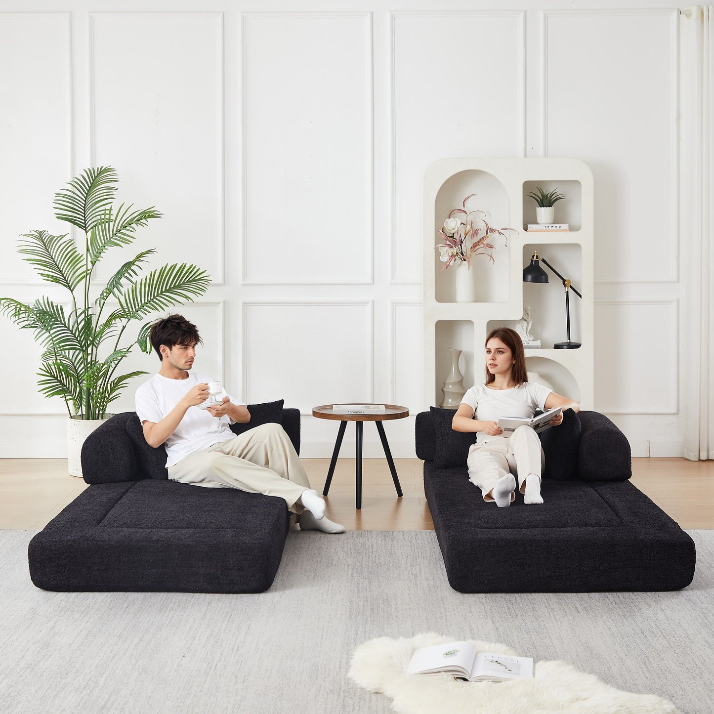 Black chenille compression sofa bed divided into two separate floor seats — Black