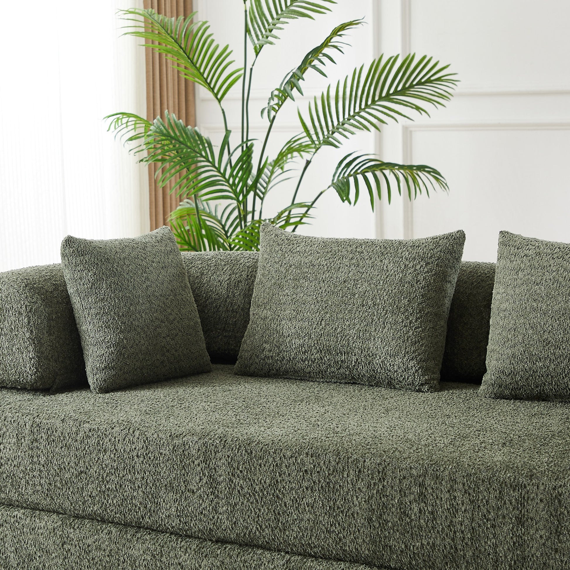 Close-up of the green chenille fabric and the bolster back cushions — Green