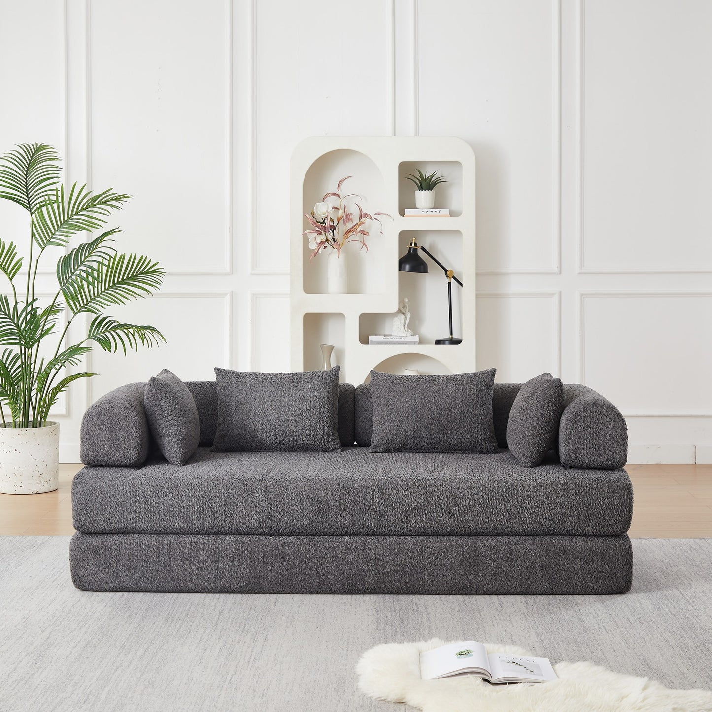 Grey chenille compression sofa bed seen at a 45-degree angle, sofa mode — Grey