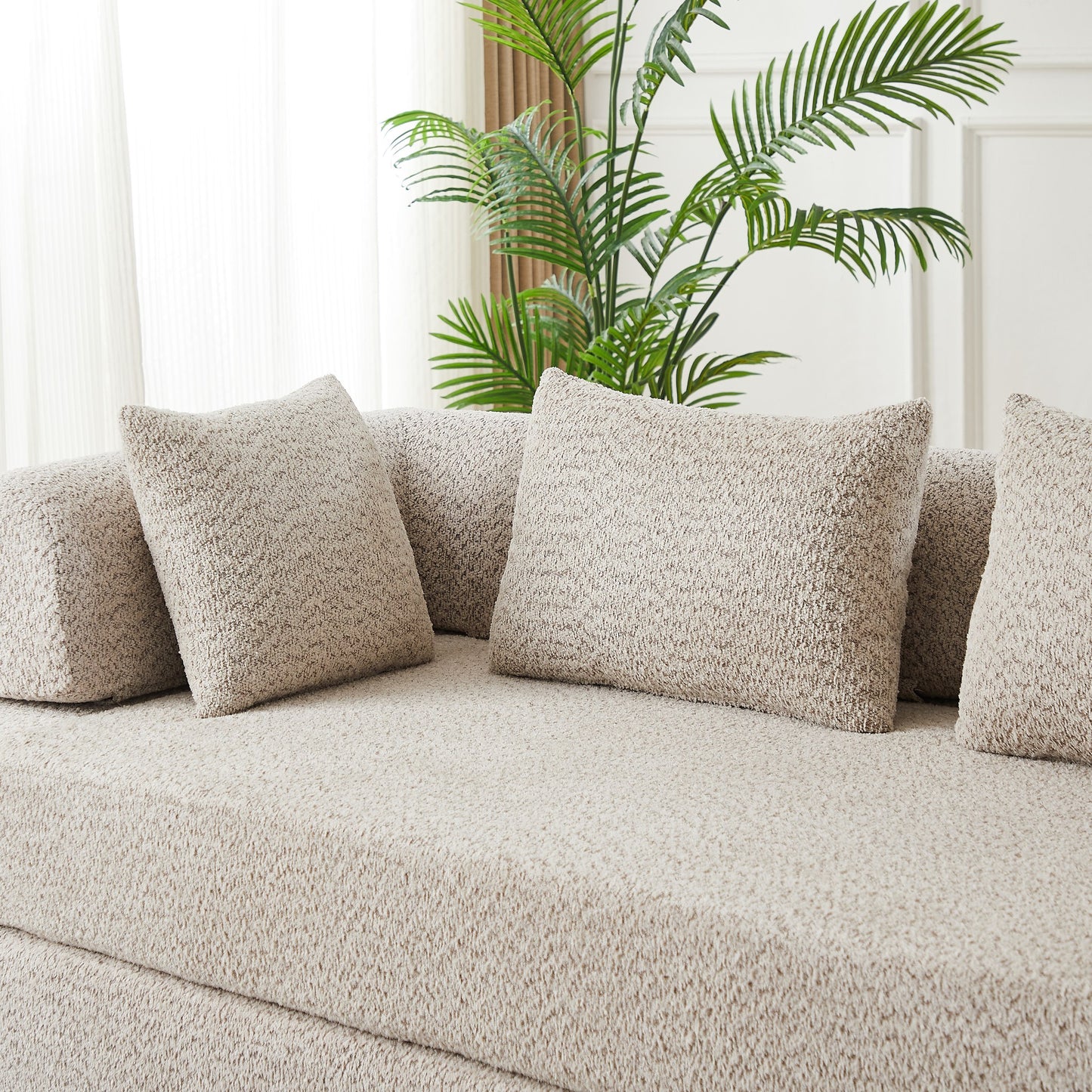 Close-up of the khaki chenille fabric and the bolster back cushions — Khaki