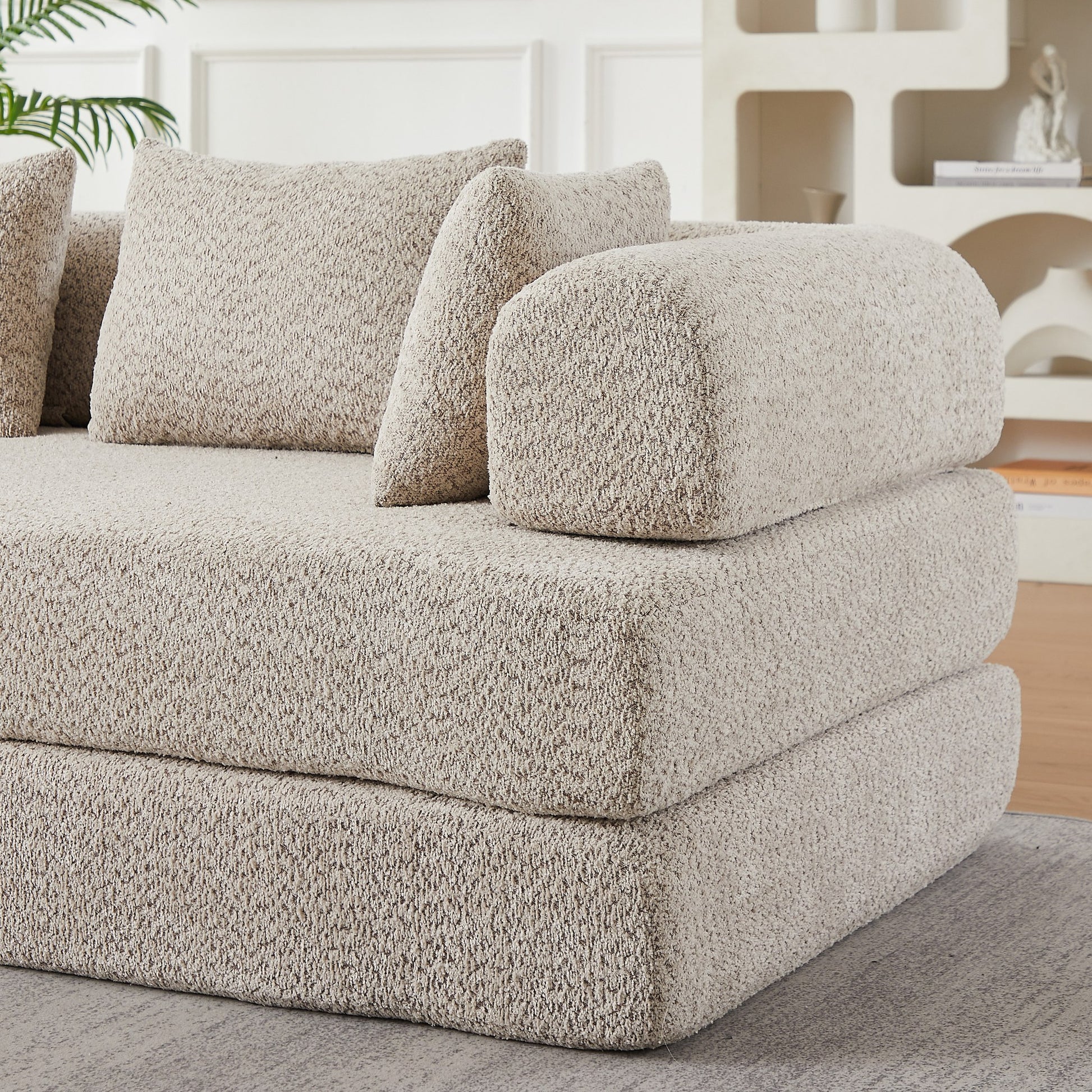 Close-up of the folded foam layers and khaki chenille upholstery — Khaki