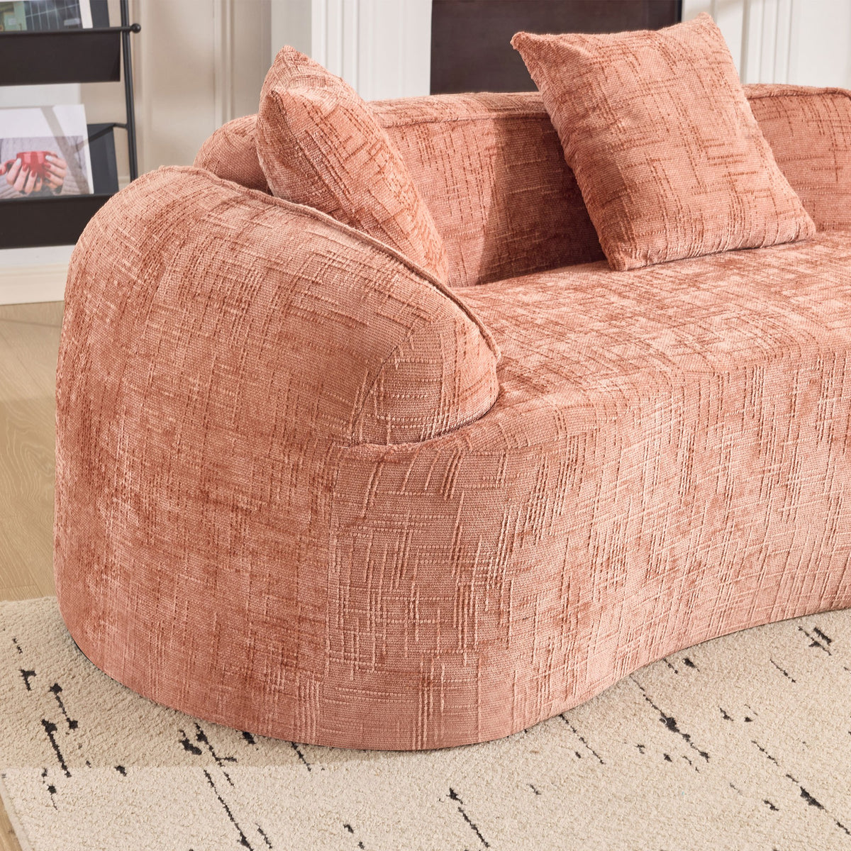 Pink chenille spring-core boneless couch, 4-seat 109-inch, close-up of the rounded arm — Pink