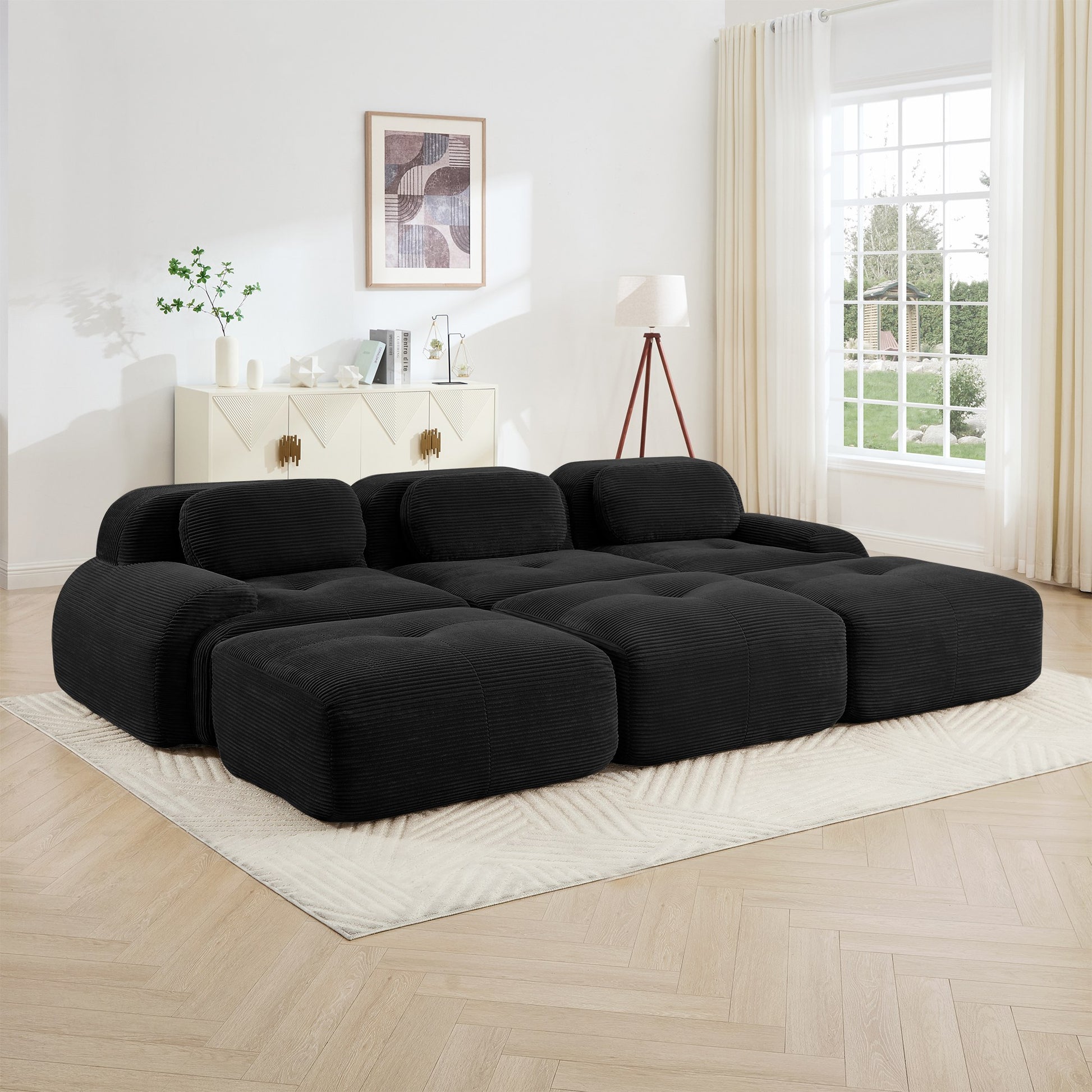 Black corduroy boneless sectional, 3-seat with three ottomans layout, straight on view in a living room — Black / 3-Seat + 3 Ottomans