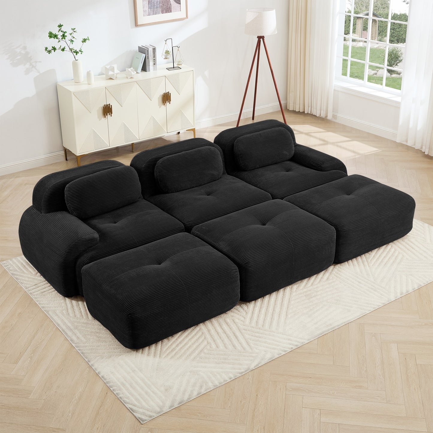 Black corduroy boneless sectional, 3-seat with three ottomans layout, angled view in a bright living room — Black / 3-Seat + 3 Ottomans