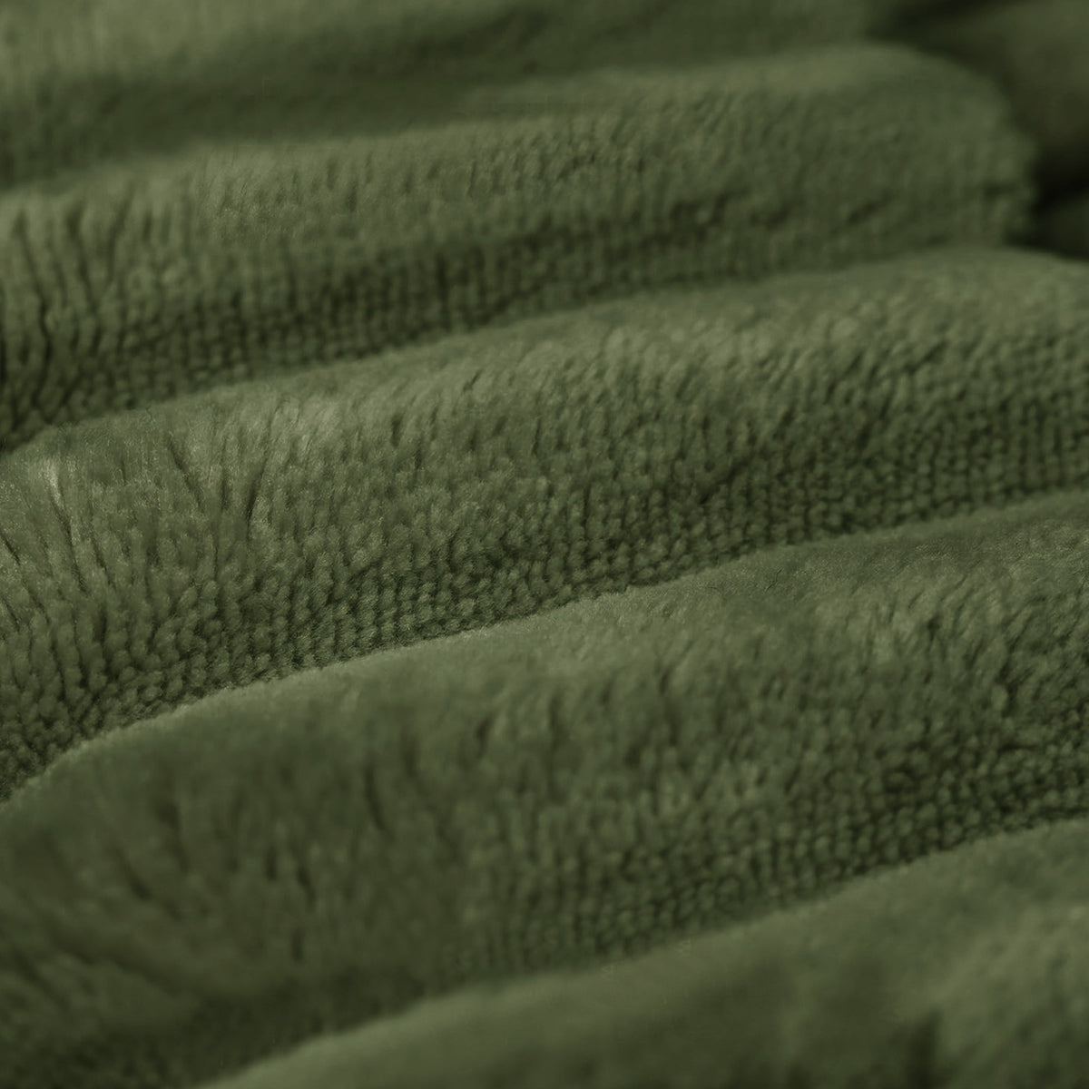 Close-up of the wide-wale green corduroy fabric and channel stitching — Green / 2-Seat (63"W)