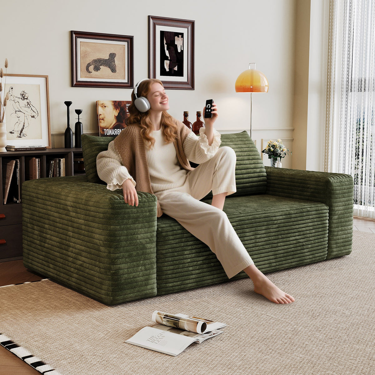 Woman relaxing on the green corduroy boneless sofa, 2-seat 63-inch, showing seat depth — Green / 2-Seat (63"W)