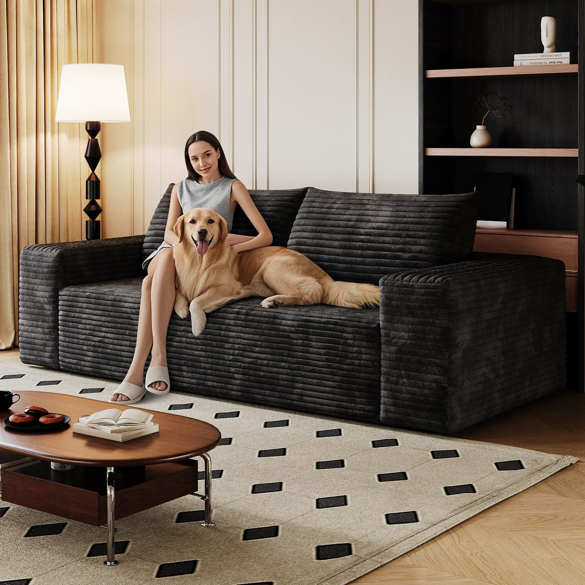 Woman relaxing on the black corduroy boneless sofa, 2-seat 71-inch, showing seat depth — Black / 2-Seat (71"W)