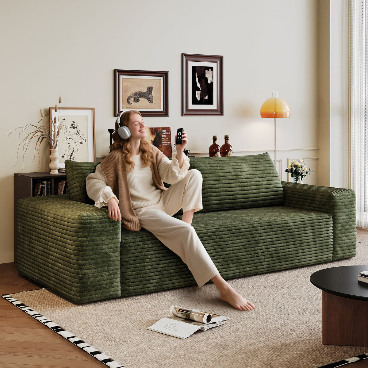 Woman relaxing on the green corduroy boneless sofa, 2-seat 71-inch, showing seat depth — Green / 2-Seat (71"W)