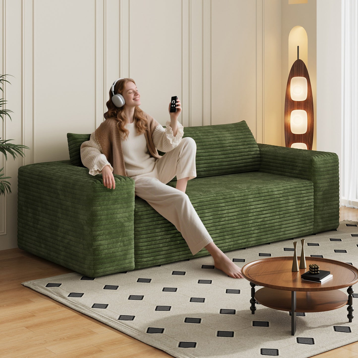 Woman relaxing on the green corduroy boneless sofa, 3-seat 78.8-inch, showing seat depth — Green / 3-Seat