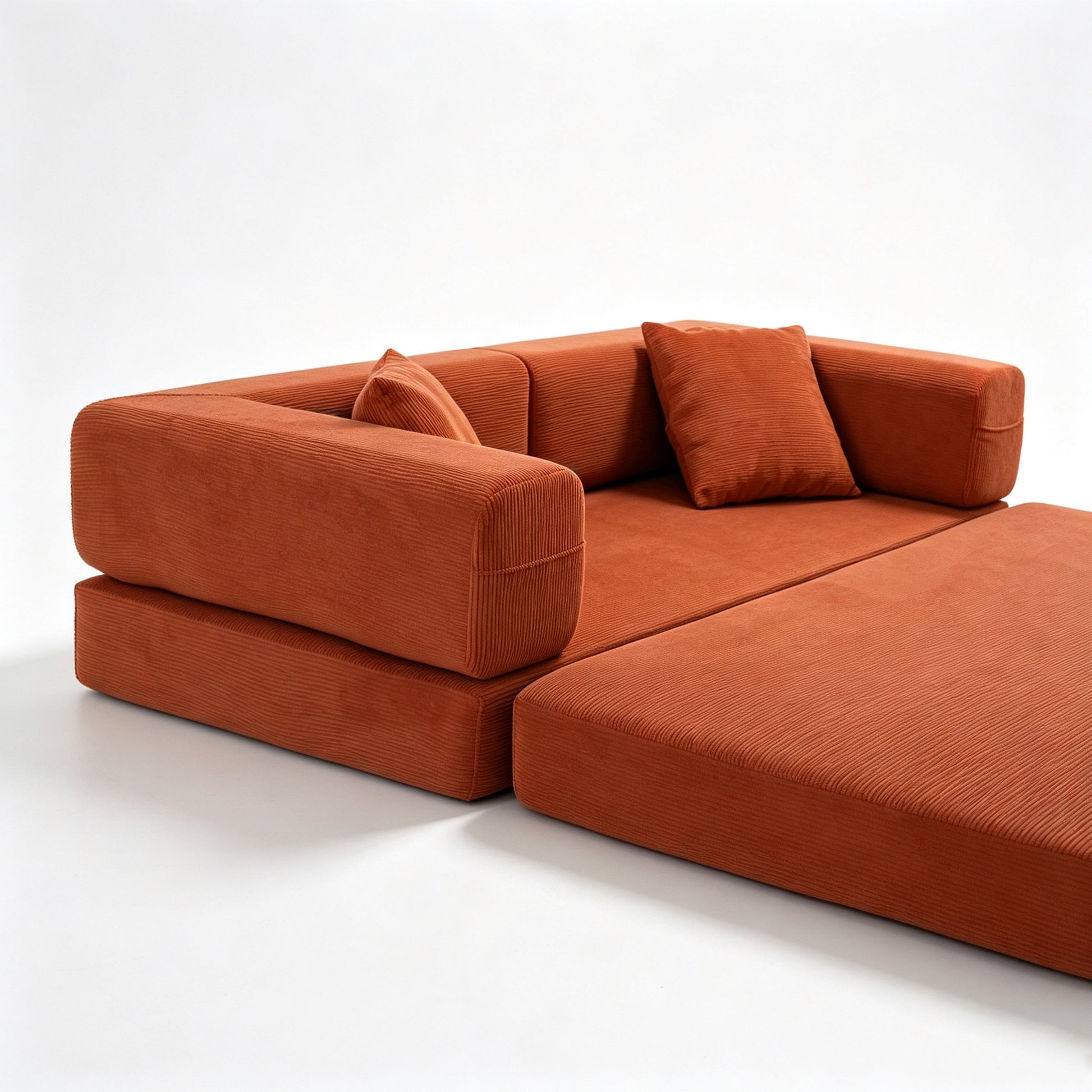 Orange corduroy boneless sofa bed in bed mode, two foam halves unfolded — Orange