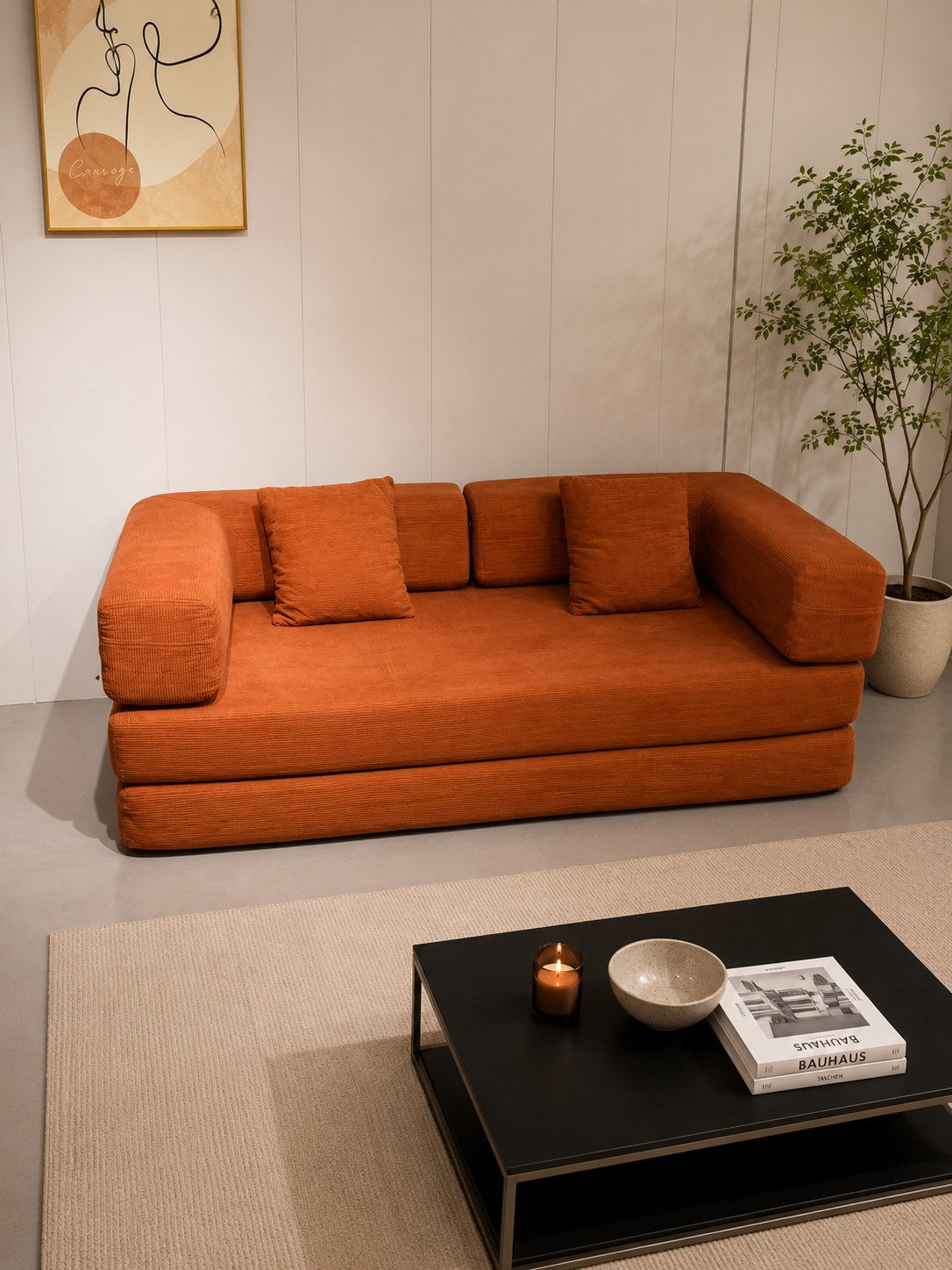 Orange corduroy boneless sofa bed in a styled living room — Orange