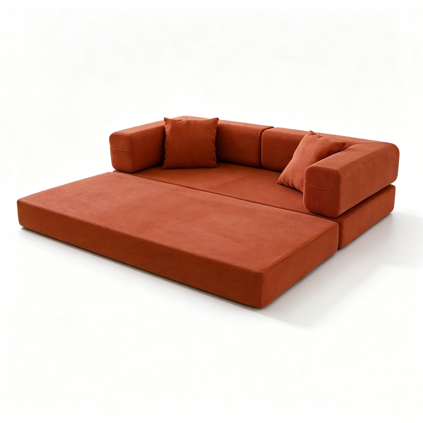 Orange corduroy boneless sofa bed laid completely flat, showing the foam mattress and loose bolsters — Orange