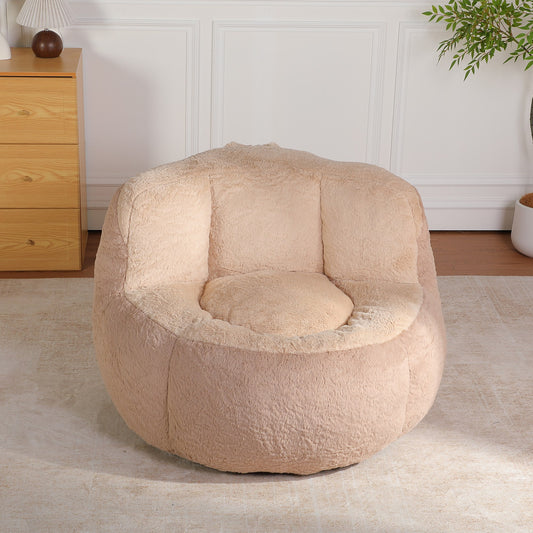 Apricot faux fur boneless accent chair (warm sand-beige) in a bedroom corner, 45-degree view — Apricot