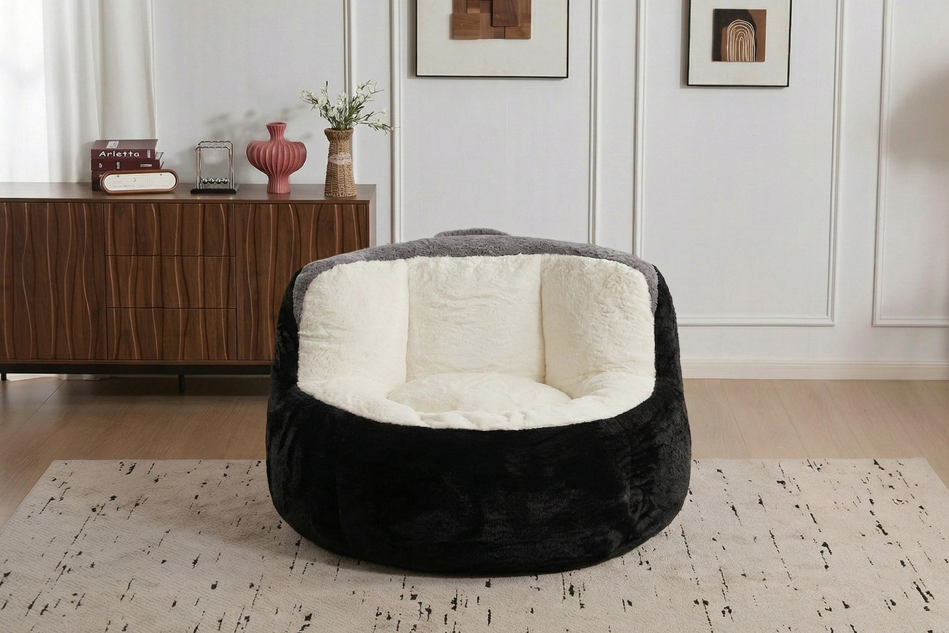 Black faux fur boneless accent chair on a rug in a living room, showing its 43-inch footprint — Black
