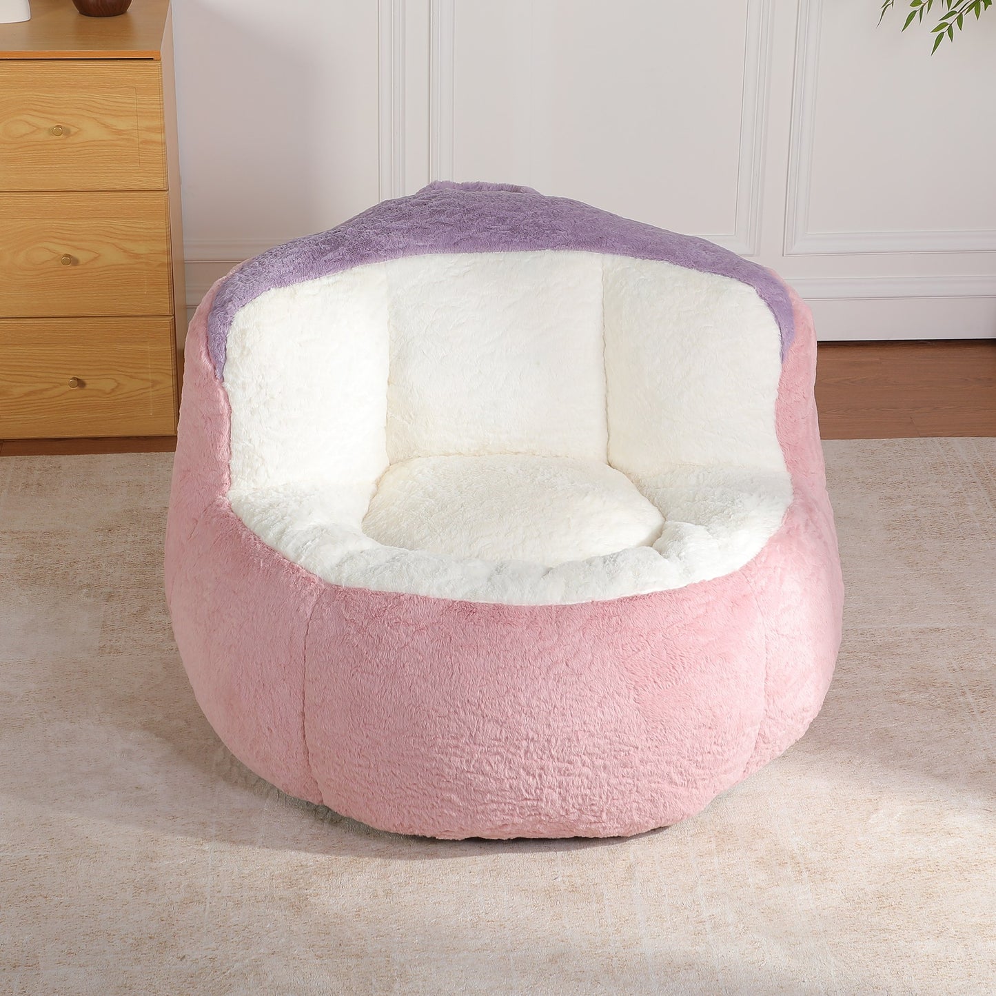 Pink faux fur boneless accent chair (pink, lilac and cream) in a bedroom corner, 45-degree view — Pink