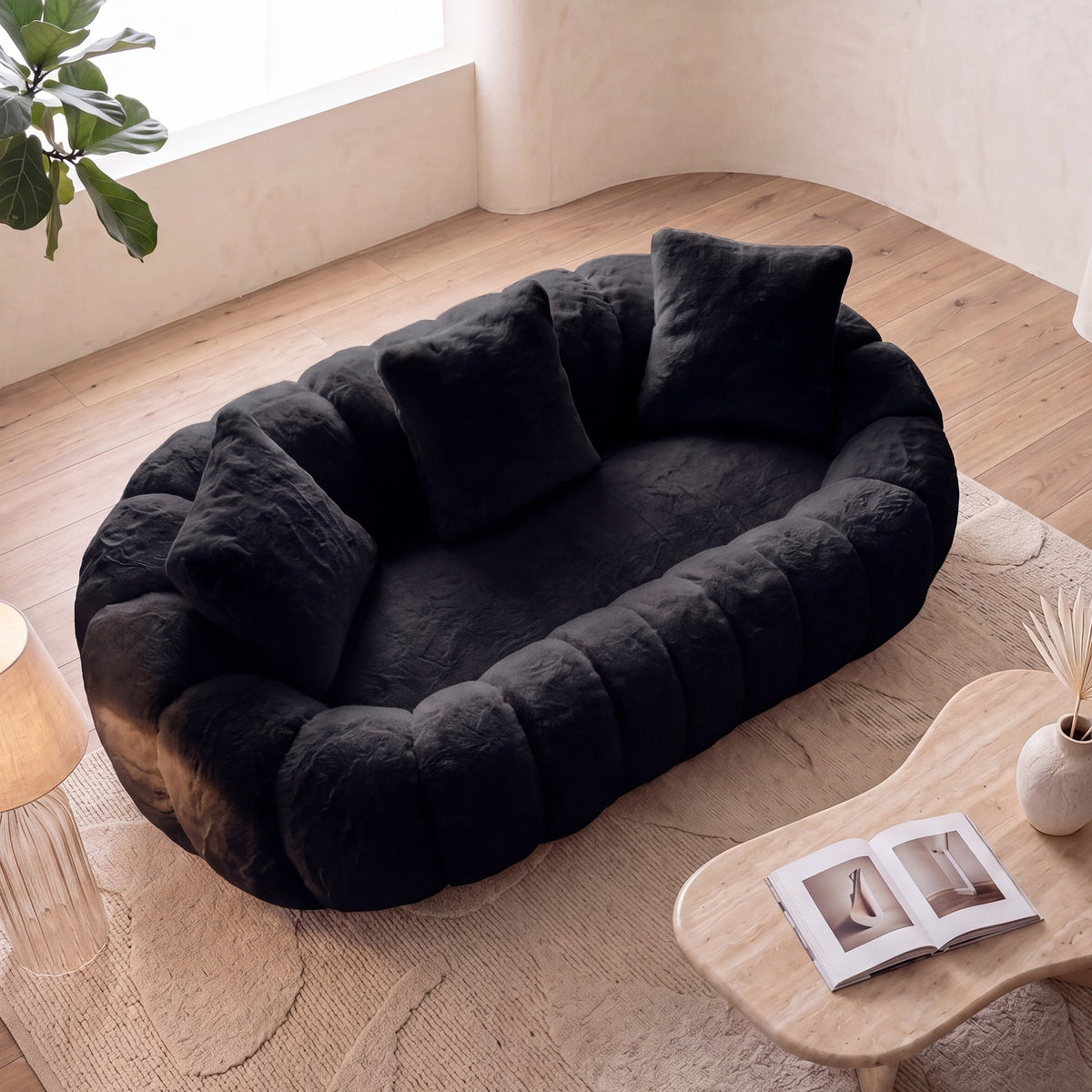 Black faux fur boneless loveseat, angled view with throw pillows — Black