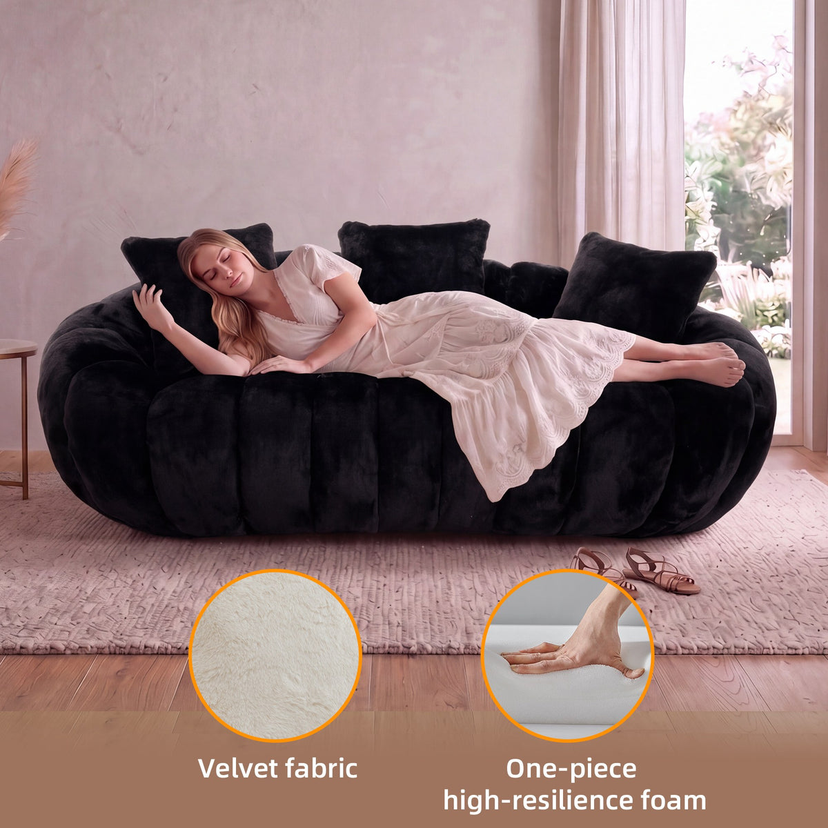 Black faux fur boneless loveseat, with a woman relaxing under a throw — Black