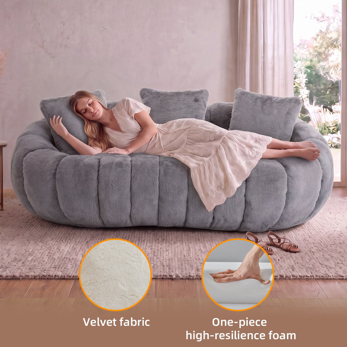 Grey faux fur boneless loveseat, with a woman relaxing under a throw — Grey