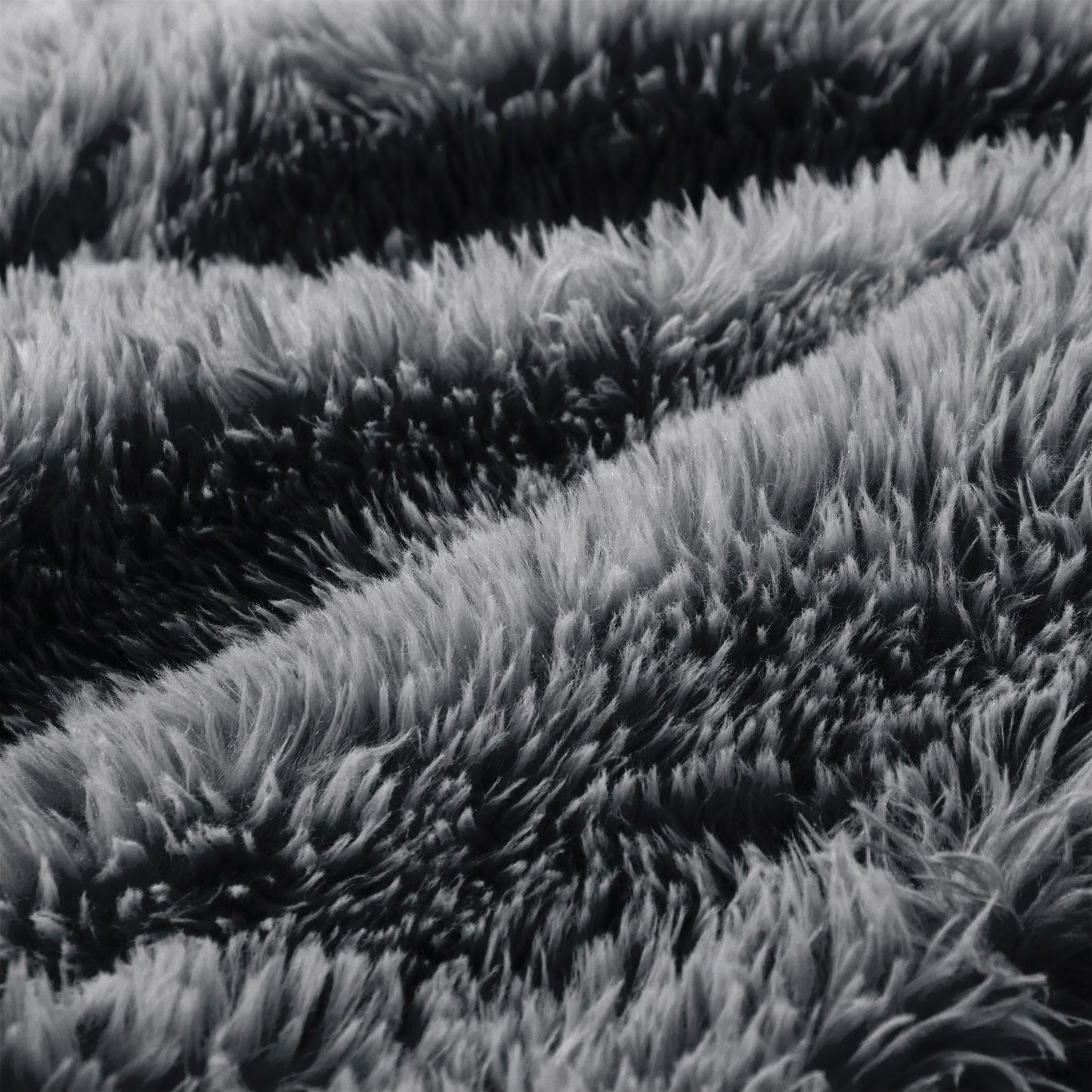 Close-up of the long-pile plush fabric on the dark grey boneless accent chair — Dark Grey