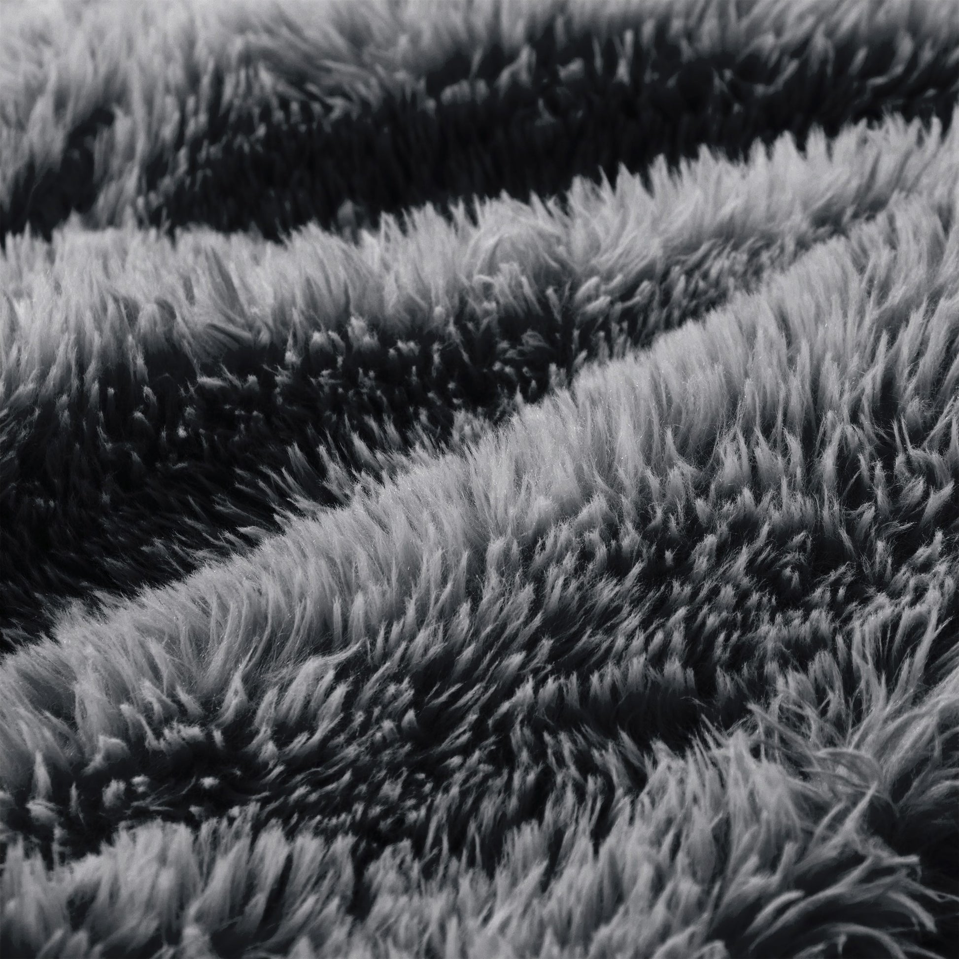Close-up of the long-pile plush fabric on the dark grey boneless accent chair — Dark Grey