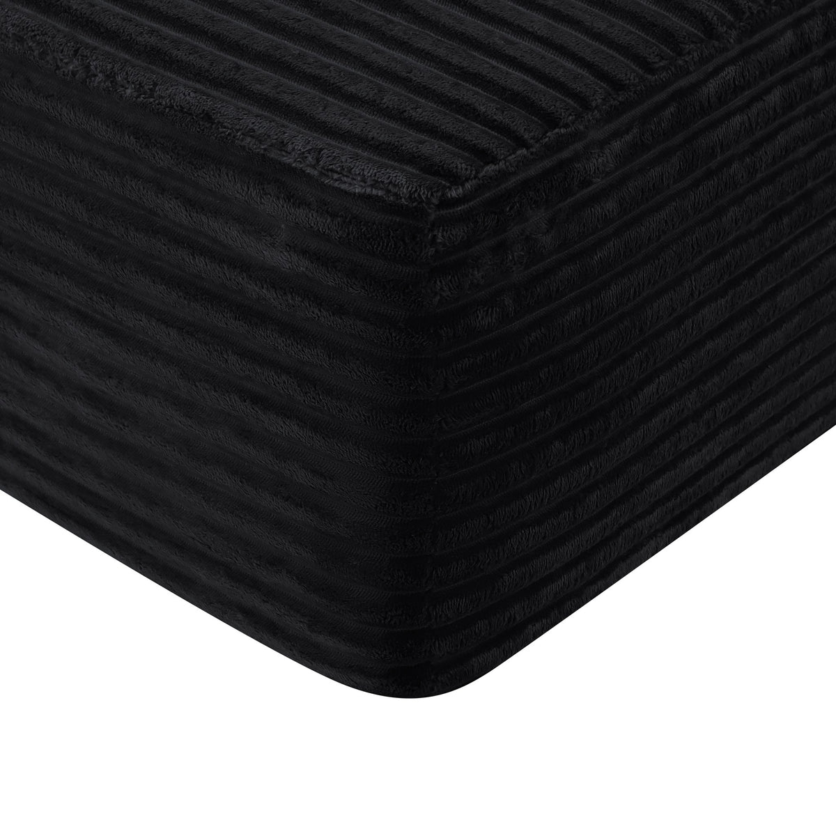 Close-up of the black channel-stitched plush fabric — Black