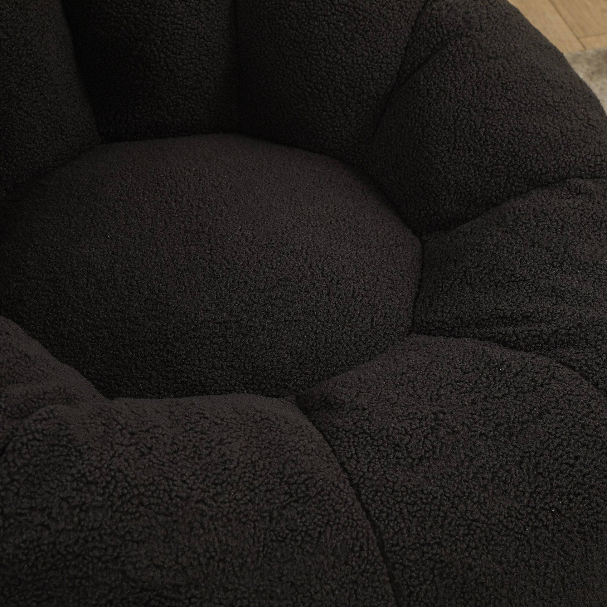 Close-up of the deep bucket seat and channel tufting — Dark Gray / 1-Seat