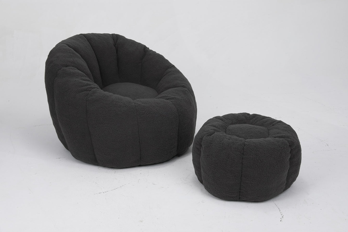 Charcoal teddy fleece accent chair with its ottoman, front three-quarter studio view — Dark Gray / 1-Seat + 1 Ottoman
