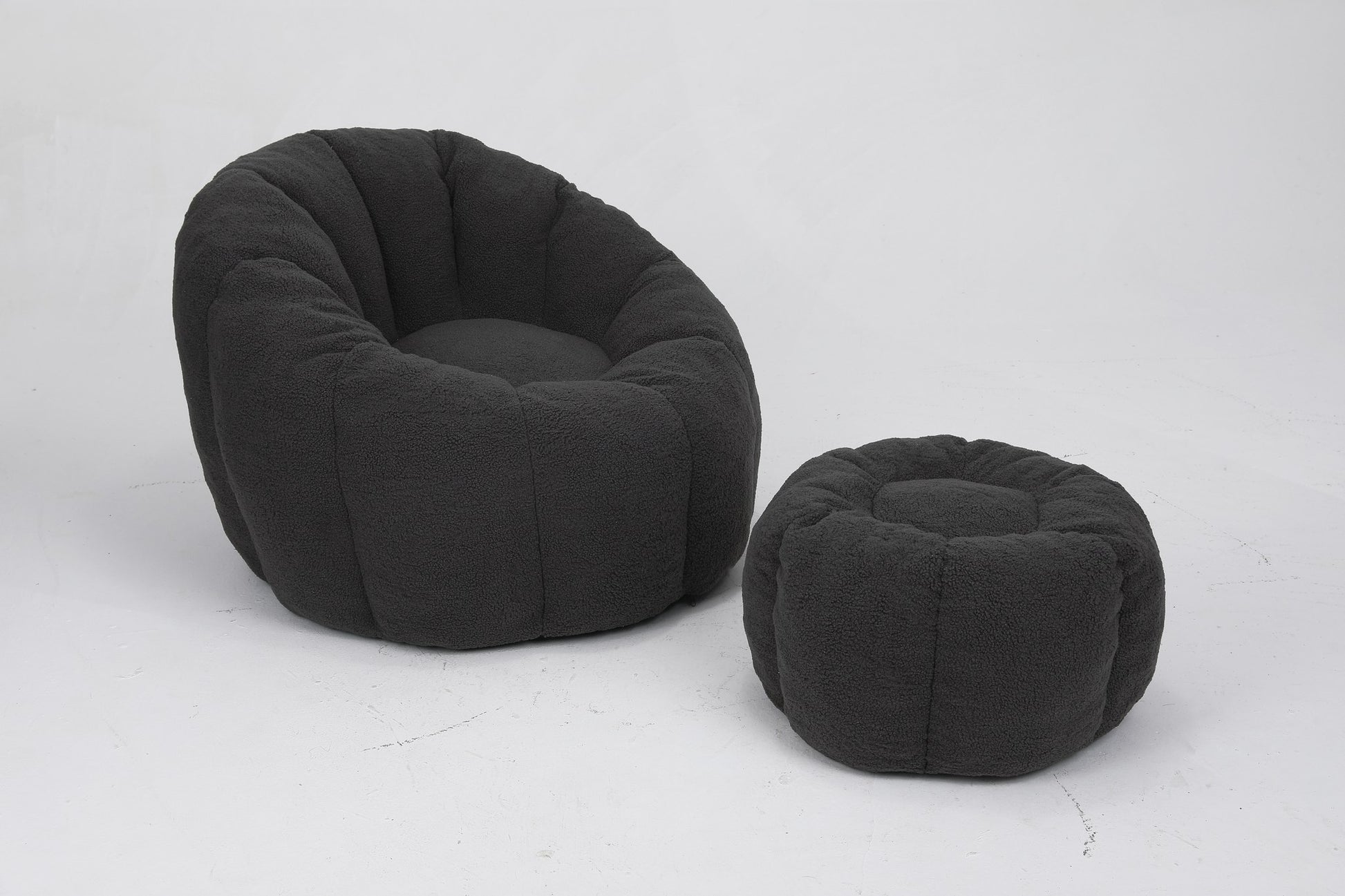 Charcoal teddy fleece accent chair with its ottoman, front three-quarter studio view — Dark Gray / 1-Seat + 1 Ottoman