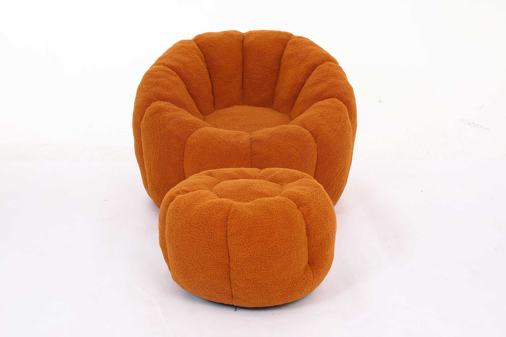 Pumpkin orange teddy fleece accent chair with its ottoman, front three-quarter studio view — Pumpkin Orange / 1-Seat + 1 Ottoman