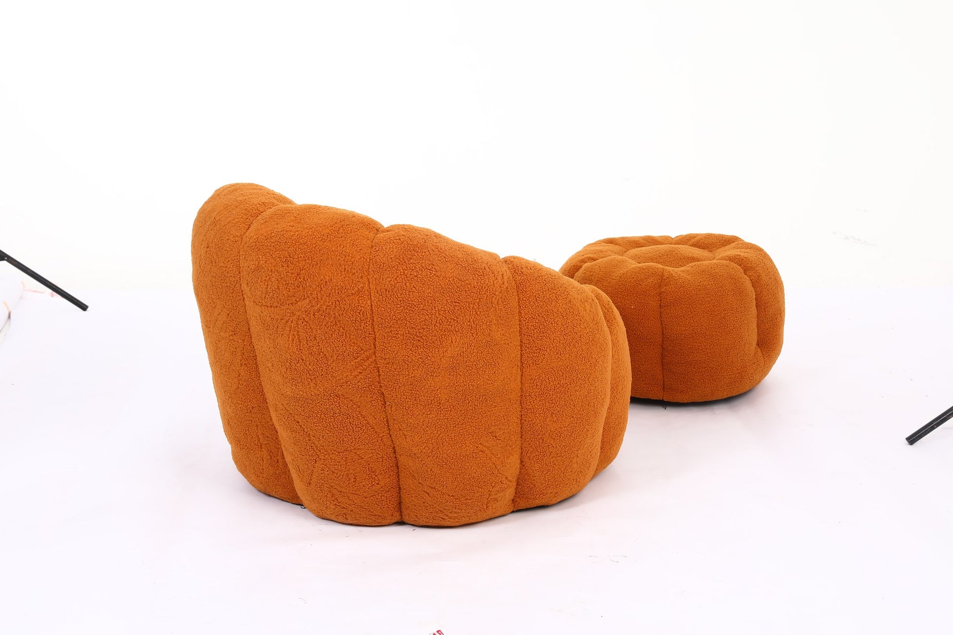 Pumpkin orange teddy fleece accent chair and ottoman from the side on a plain white floor — Pumpkin Orange / 1-Seat + 1 Ottoman