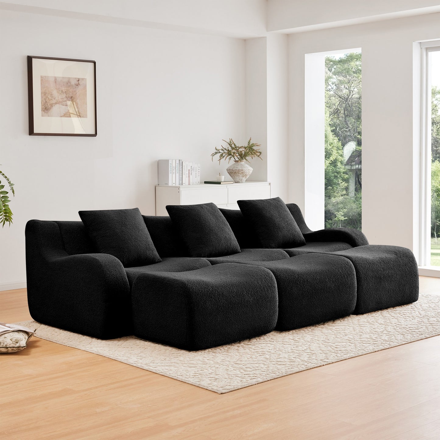 Black teddy fleece boneless sofa, 3-seat with three ottomans layout, angled view in a bright living room — Black / 3-Seat + 3 Ottomans