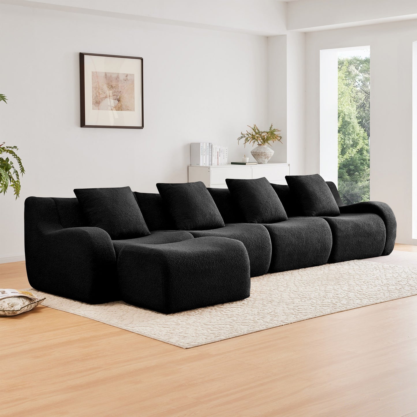 Black teddy fleece boneless sofa, 4-seat with one ottoman layout, angled view in a bright living room — Black / 4-Seat + 1 Ottoman