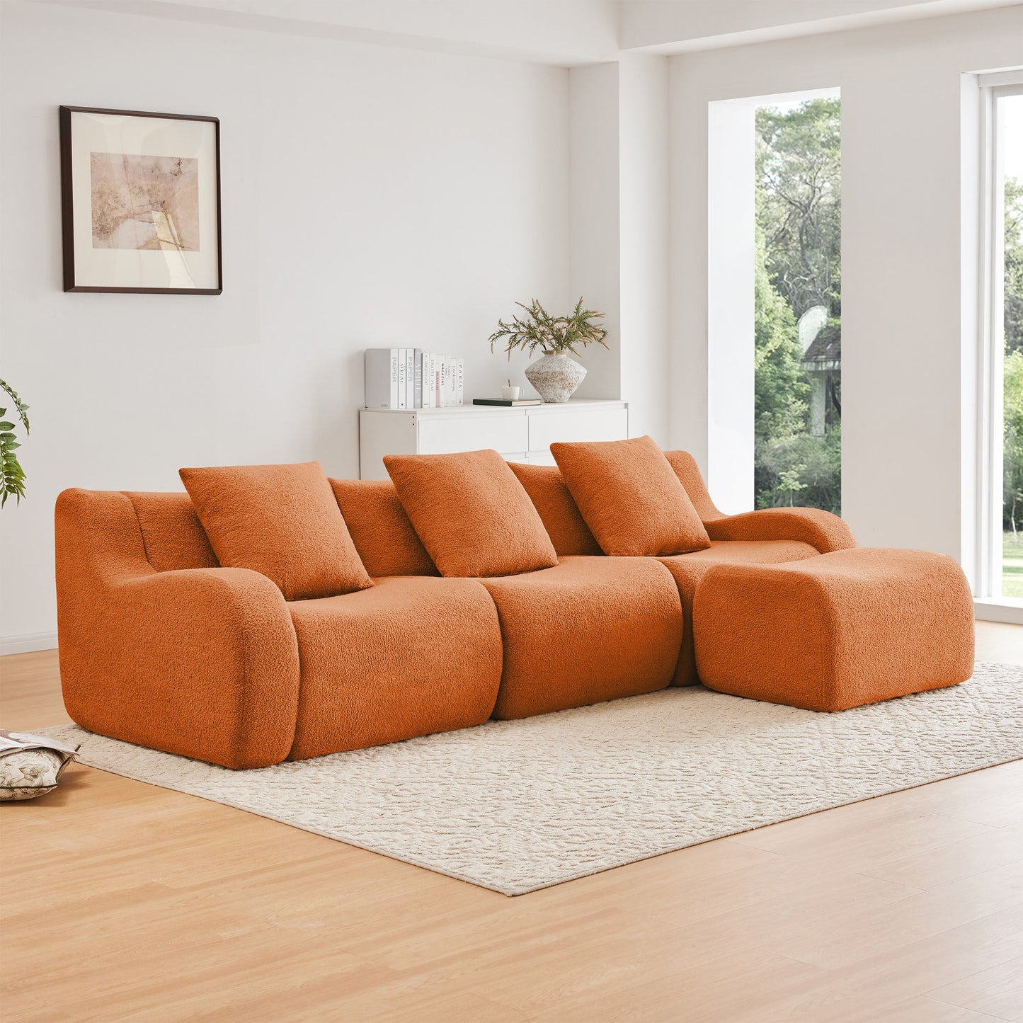 Orange teddy fleece boneless sofa, 3-seat with one ottoman layout, angled view in a bright living room — Orange / 3-Seat + 1 Ottoman
